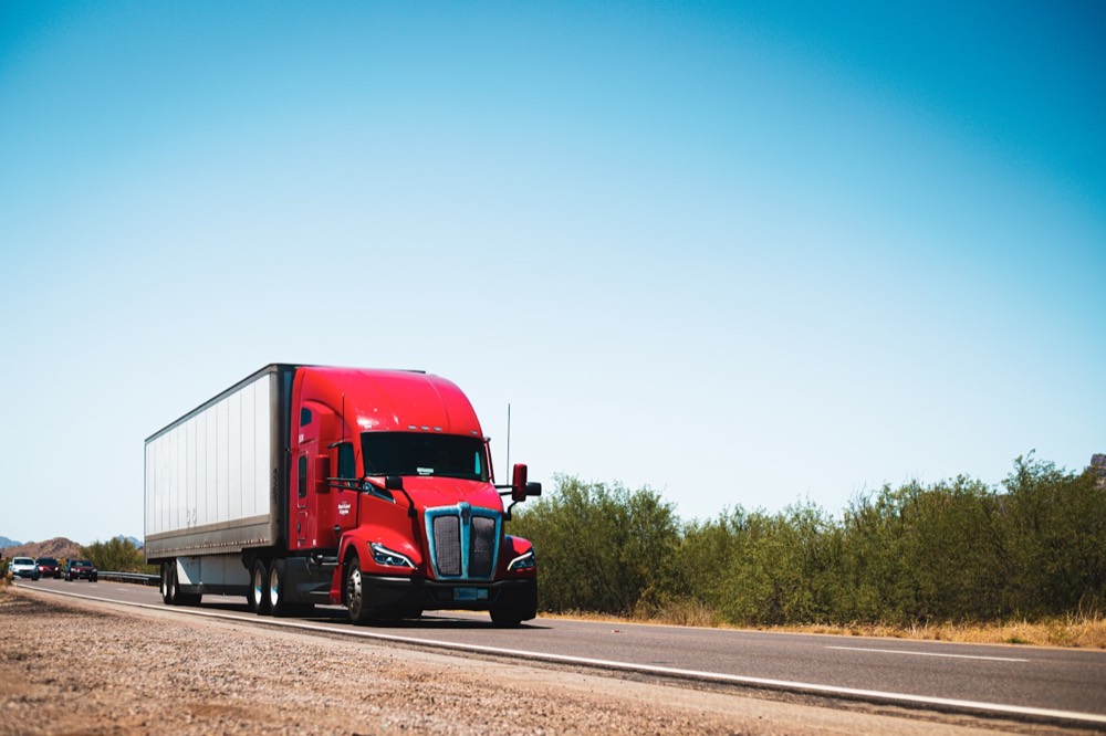 A semi truck on an open highway